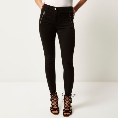Black zip detail skinny trousers